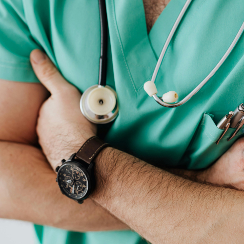 Photo by Karolina Grabowska www.kaboompics.com: https://www.pexels.com/photo/crop-doctor-with-stethoscope-in-hospital-4021779/